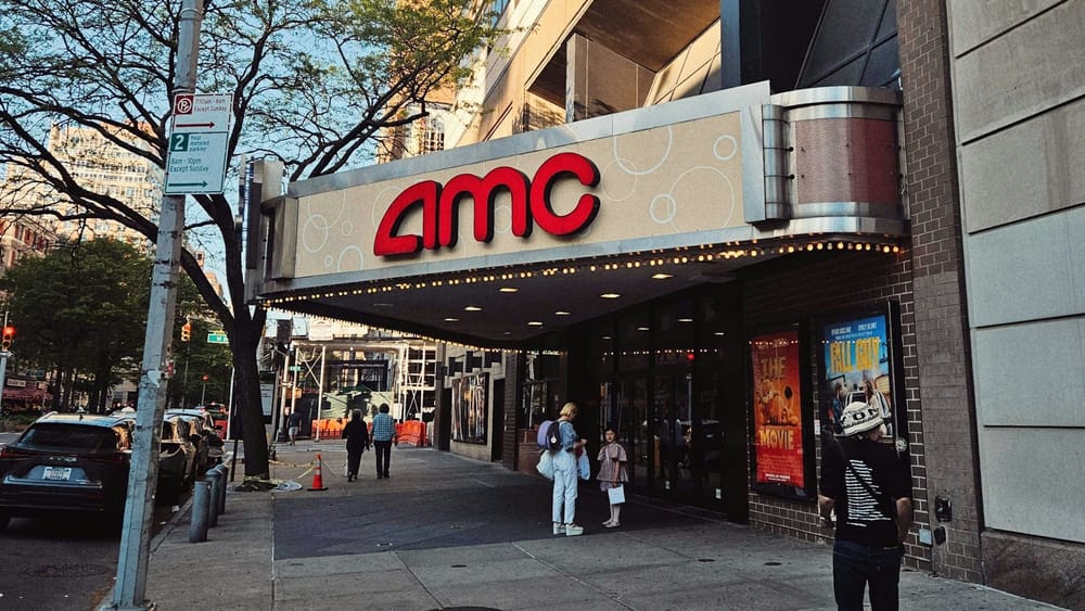 AMC secures refinancing deal and posts preliminary full-year revenue growth post image